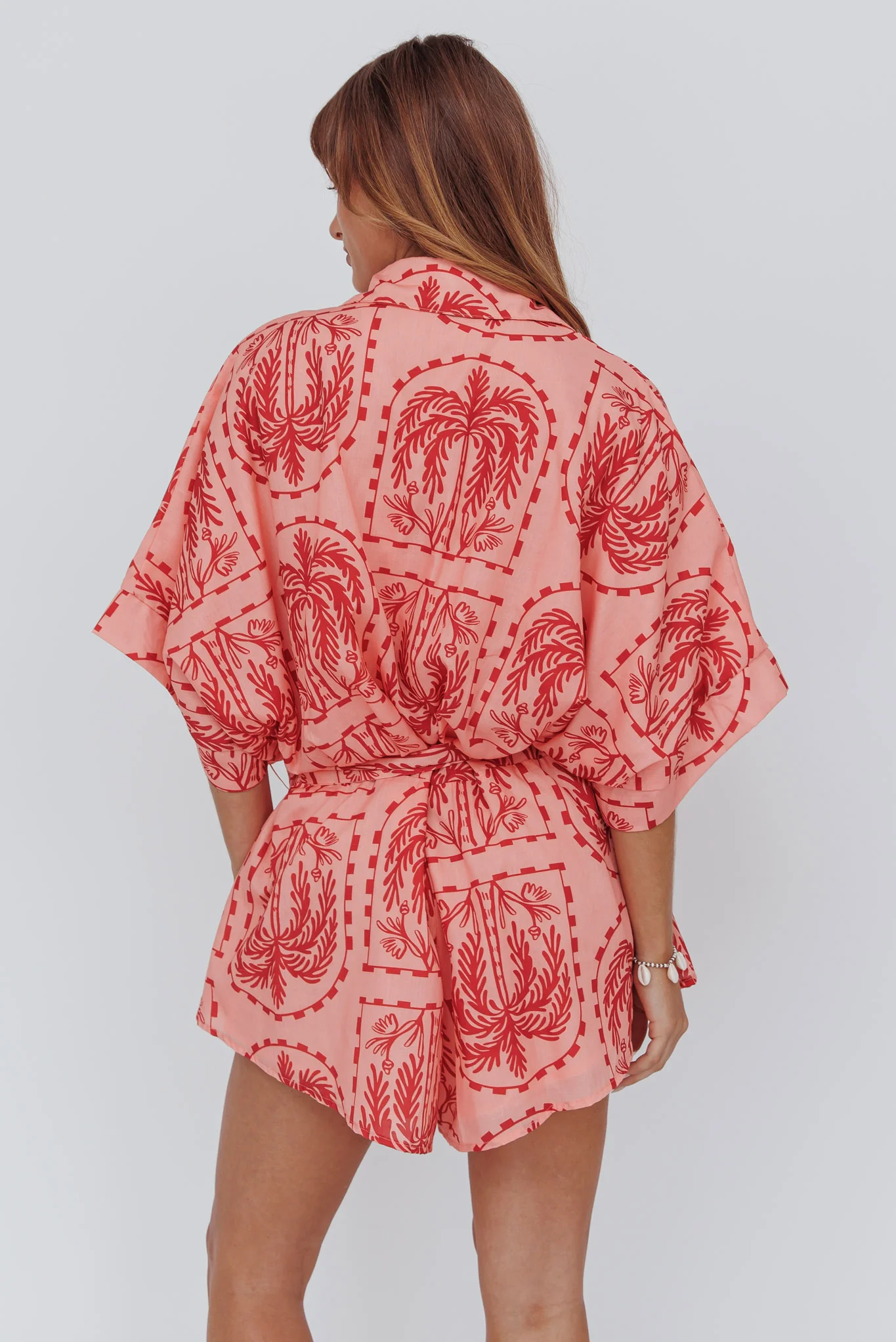 Daytona Beach Button-Up Romper Print Peach - Sonourner